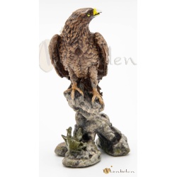 Aguila en tronco 9 cm.