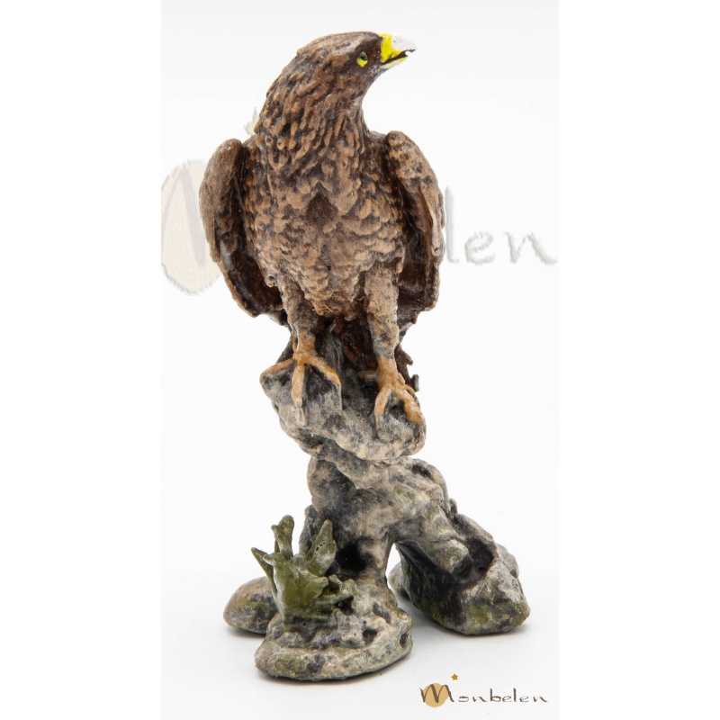Aguila en tronco 7 cm.